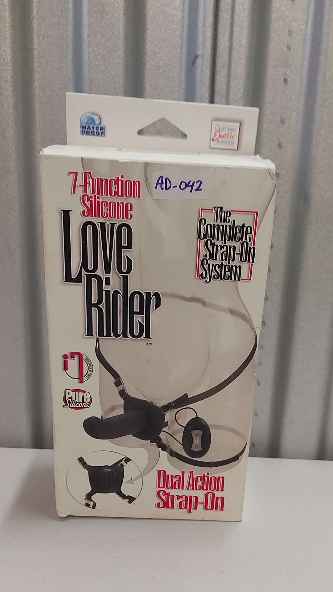 AD-042 California Exotic: 7-function Silicone Love Rider Dual Action Strap-On, Black